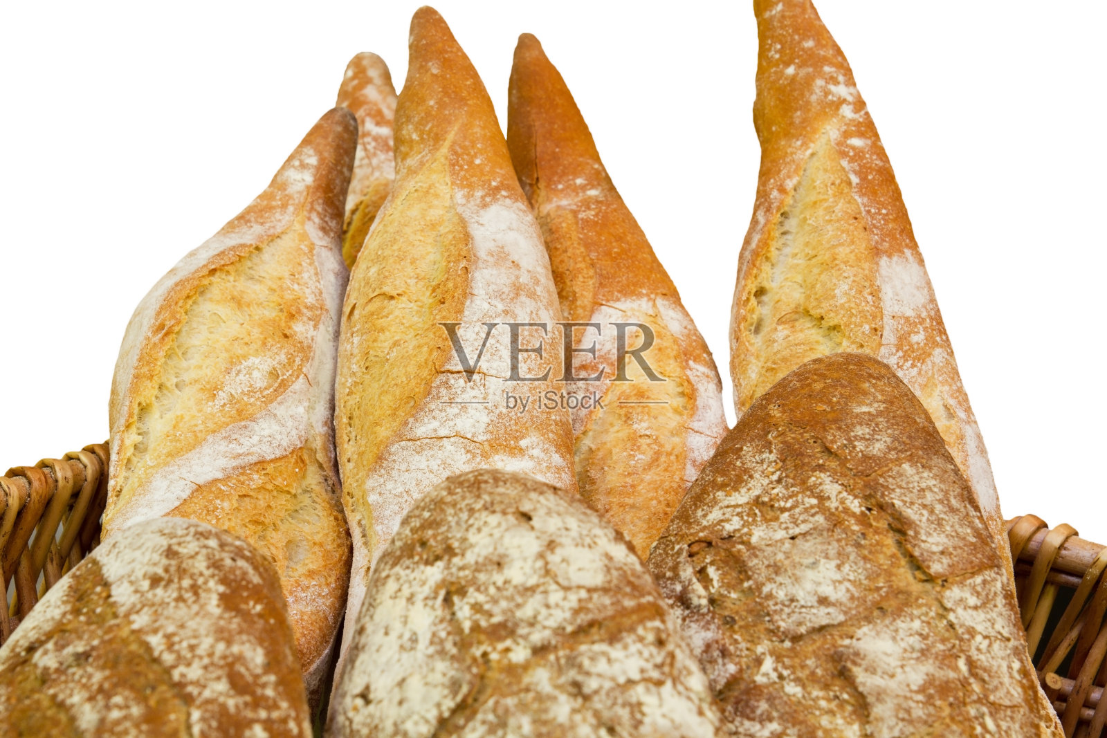 不同种类的面包放在一个篮子里照片摄影图片