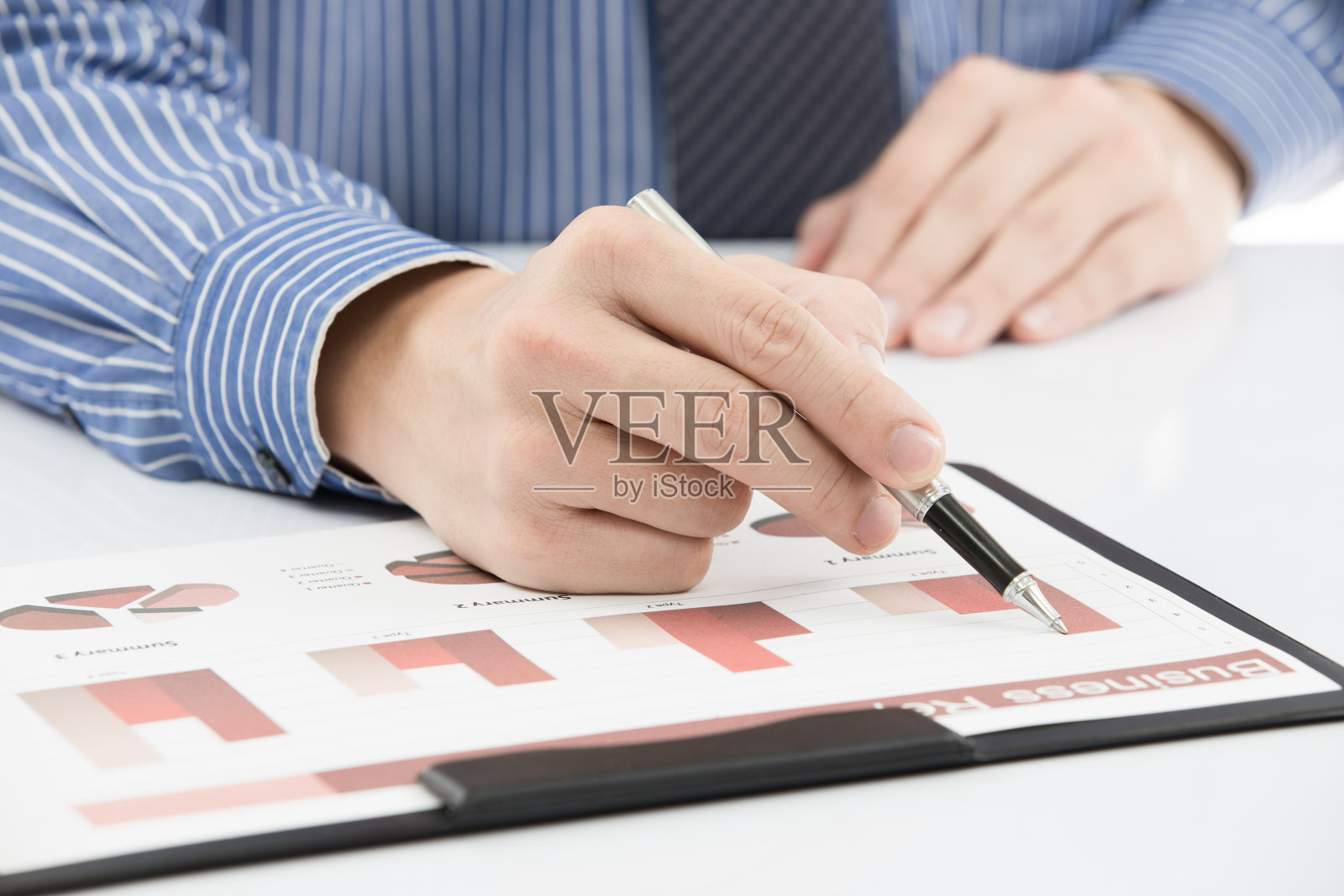 业务报告和人手照片摄影图片