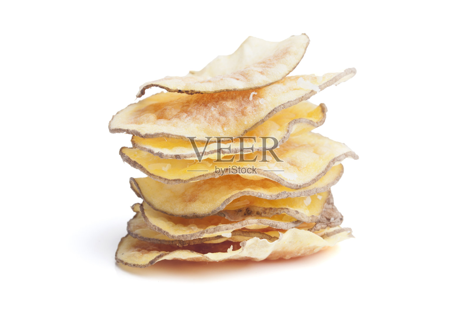 白色背景上的一堆薯片照片摄影图片