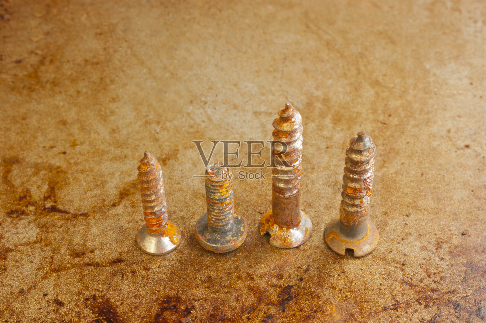 生锈的螺丝。照片摄影图片