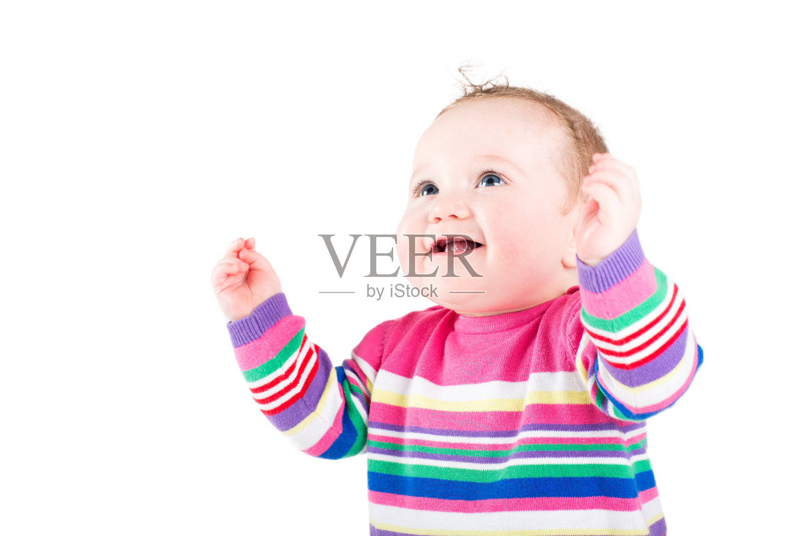 可爱的小女孩穿着粉色条纹裙照片摄影图片