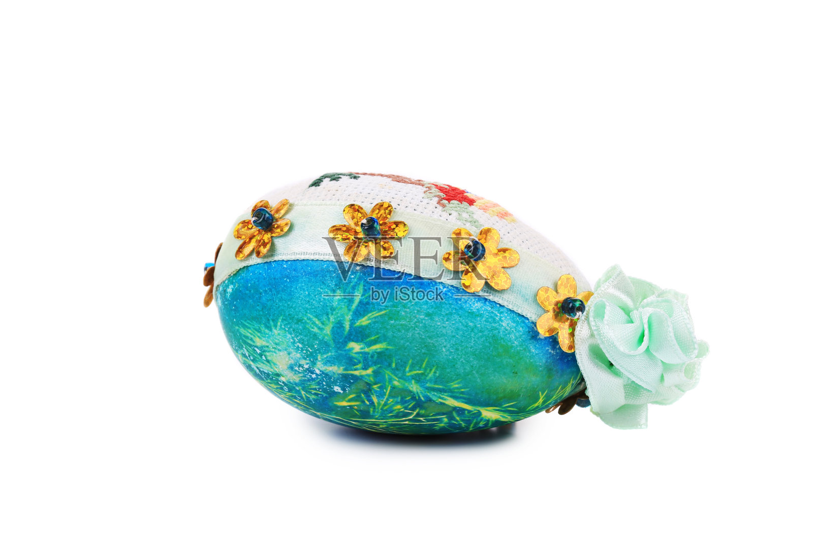 有刺绣的复活节彩蛋。照片摄影图片