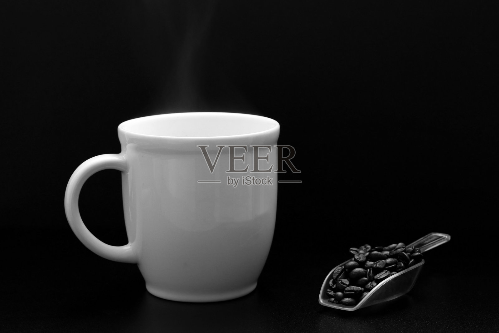 咖啡杯和豆子照片摄影图片