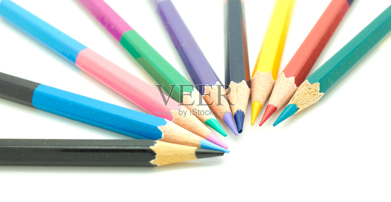 色彩鲜艳的木制铅笔。照片摄影图片