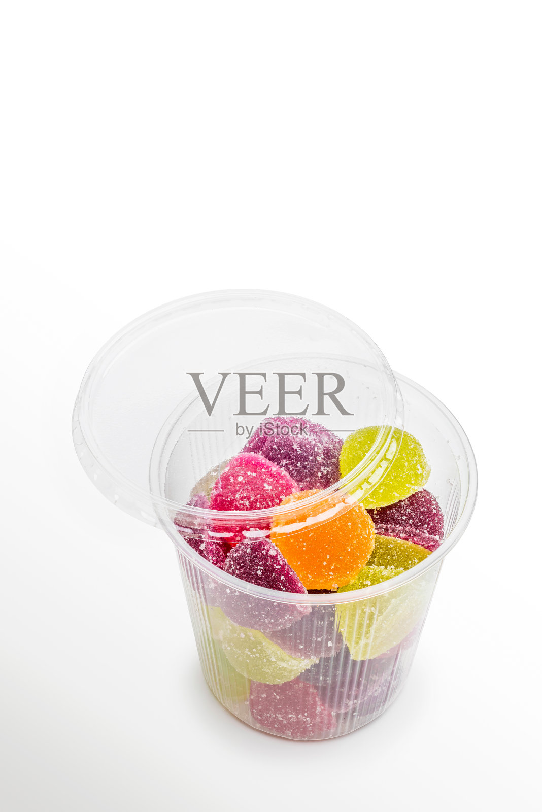 塑料罐里的水果果冻照片摄影图片