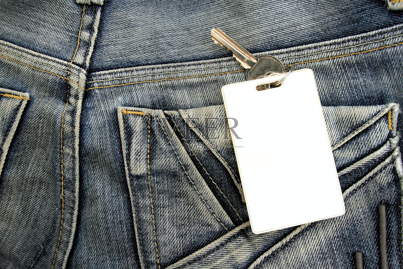 特写的牛仔裤口袋与挂锁照片摄影图片