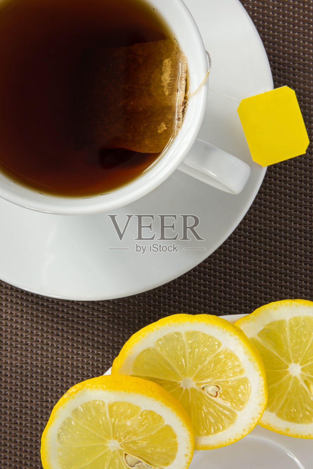 茶杯和柠檬片照片摄影图片