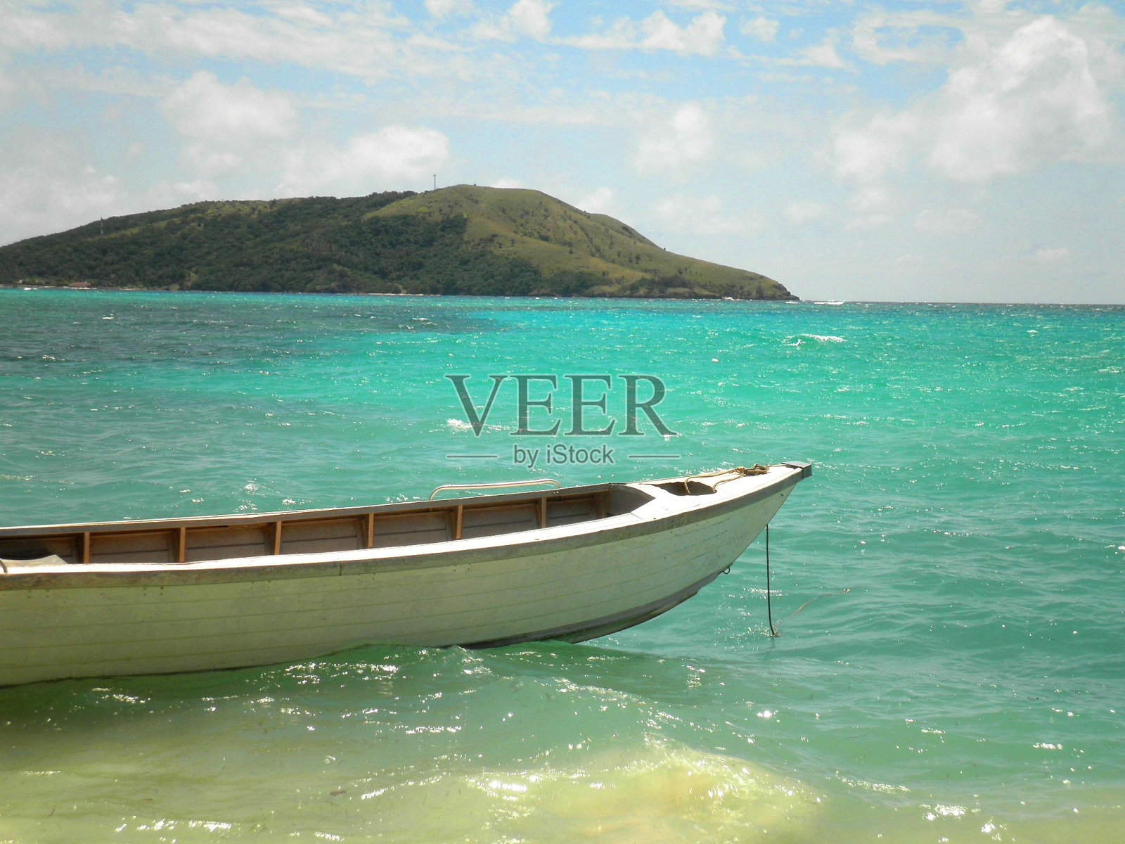 阳光明媚的斐济之舟照片摄影图片