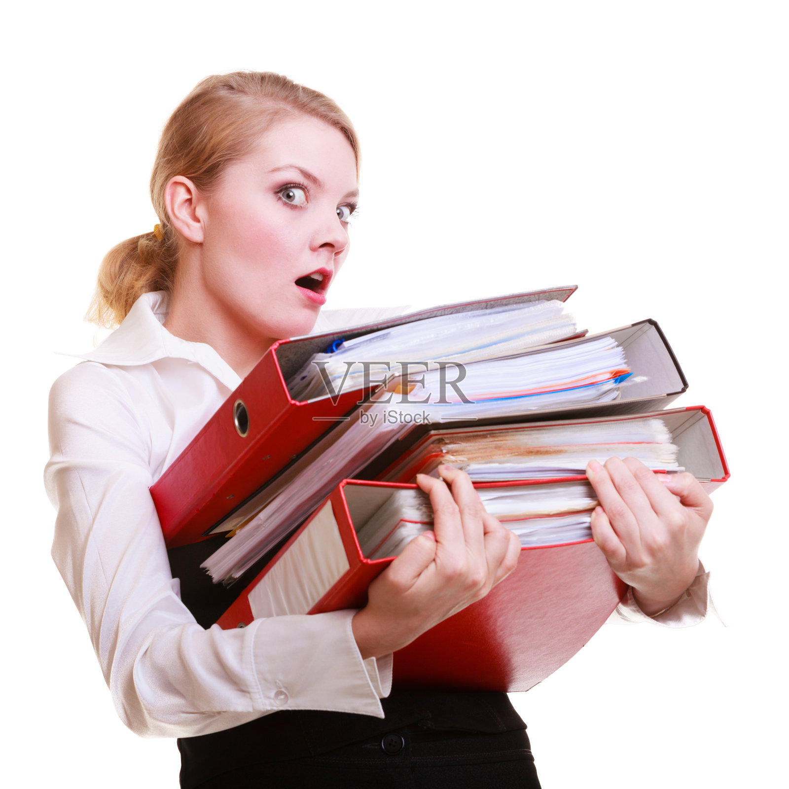 年轻过度操劳的女商人拿着文件夹和文件照片摄影图片