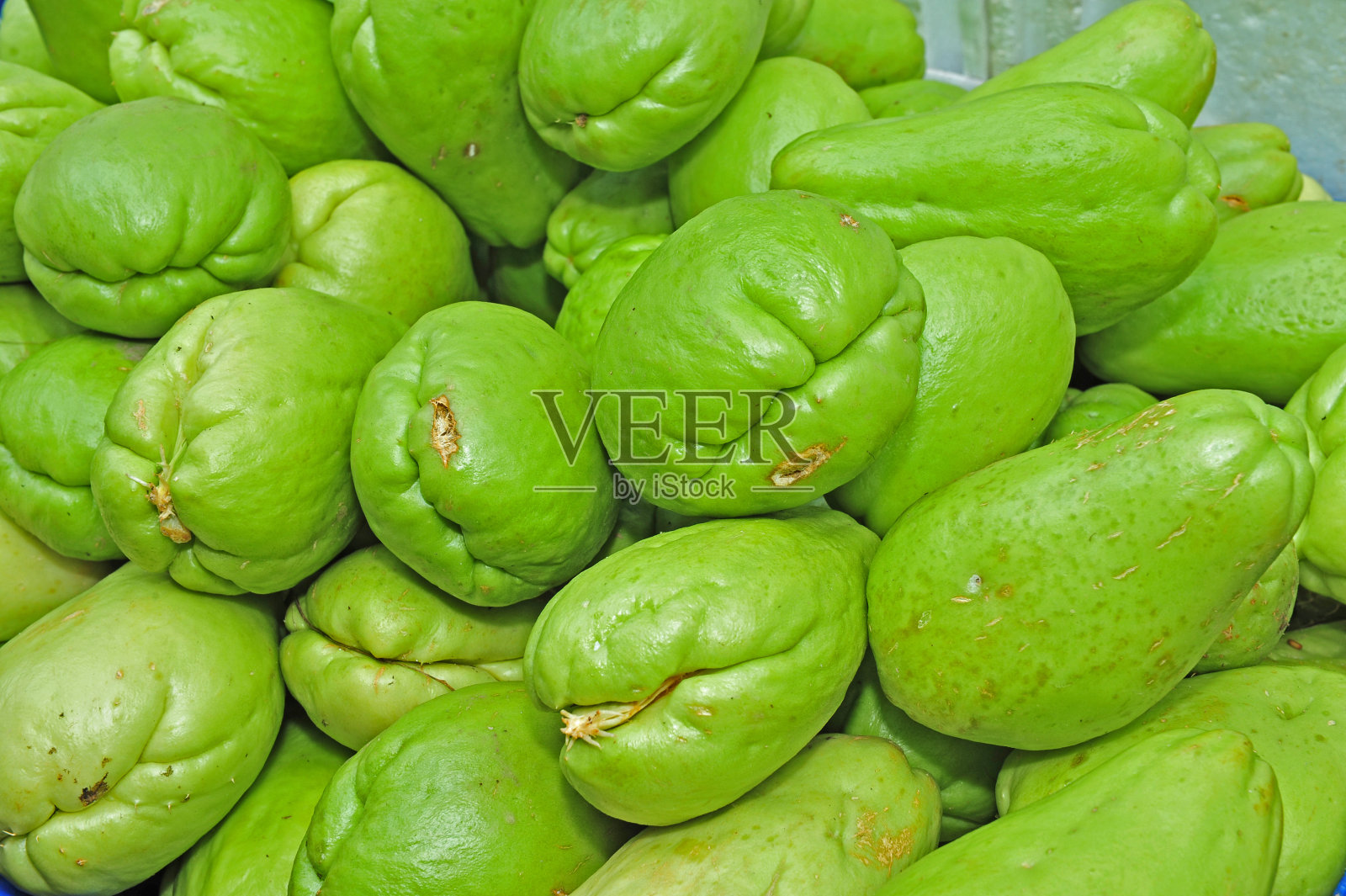 查约特水果在市场上出售照片摄影图片