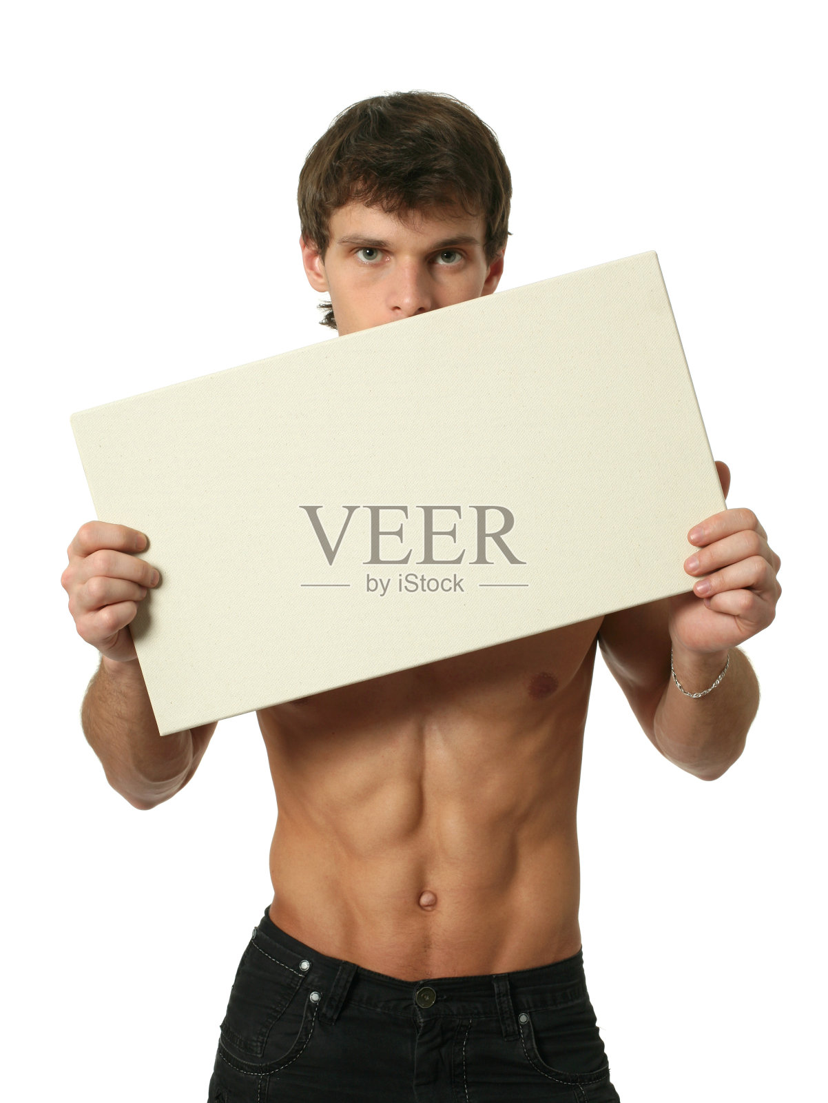 年轻性感的男人与复制空间空白标志照片摄影图片