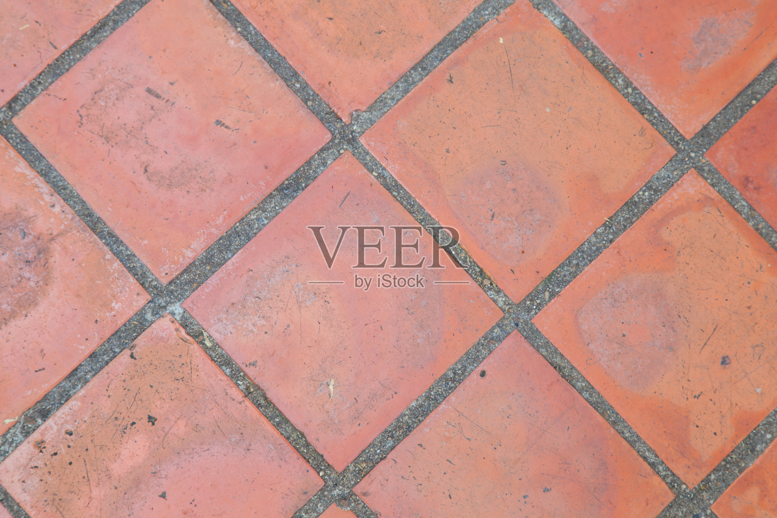 旧的红色的墙。照片摄影图片