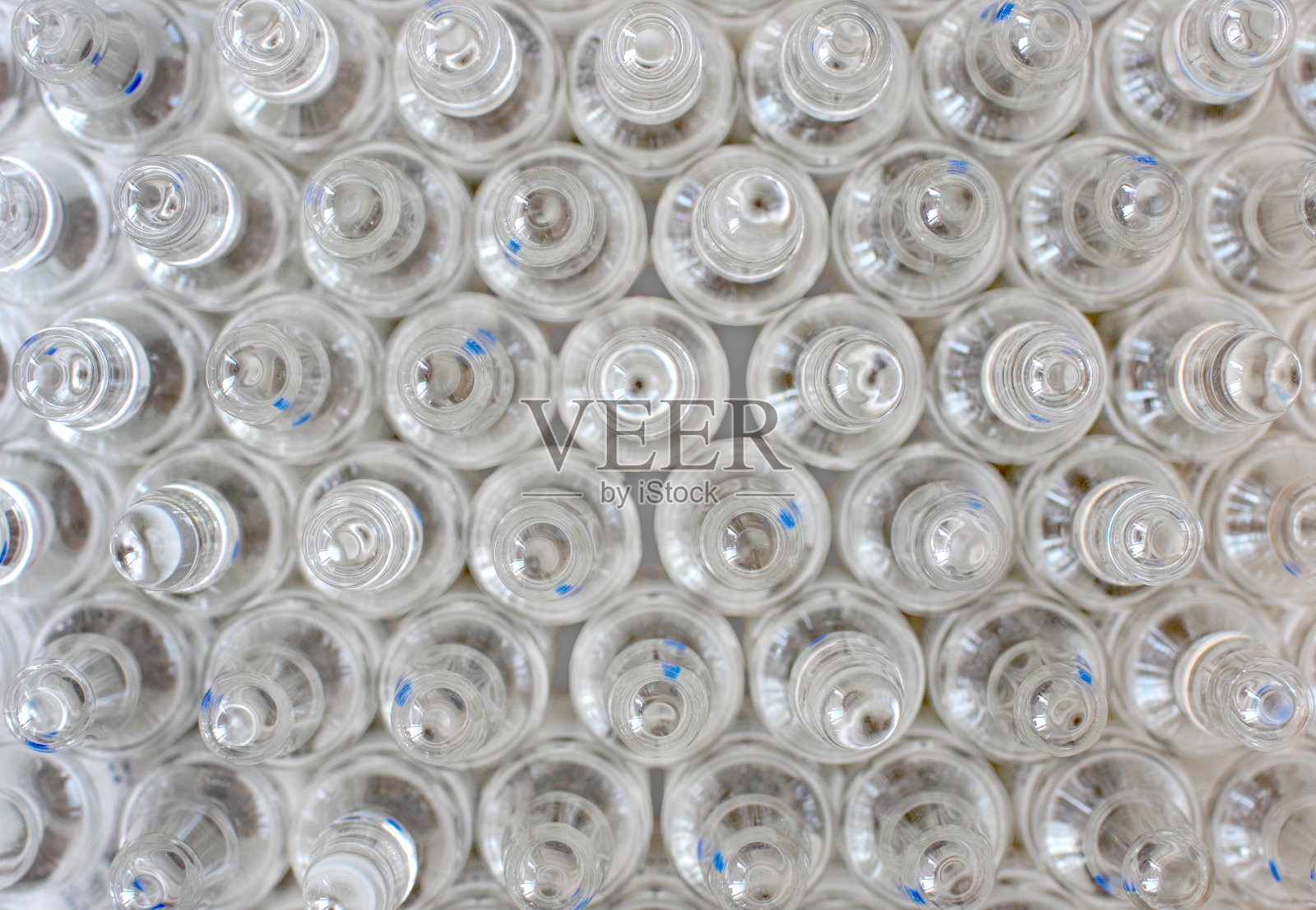 一系列透明小瓶照片摄影图片