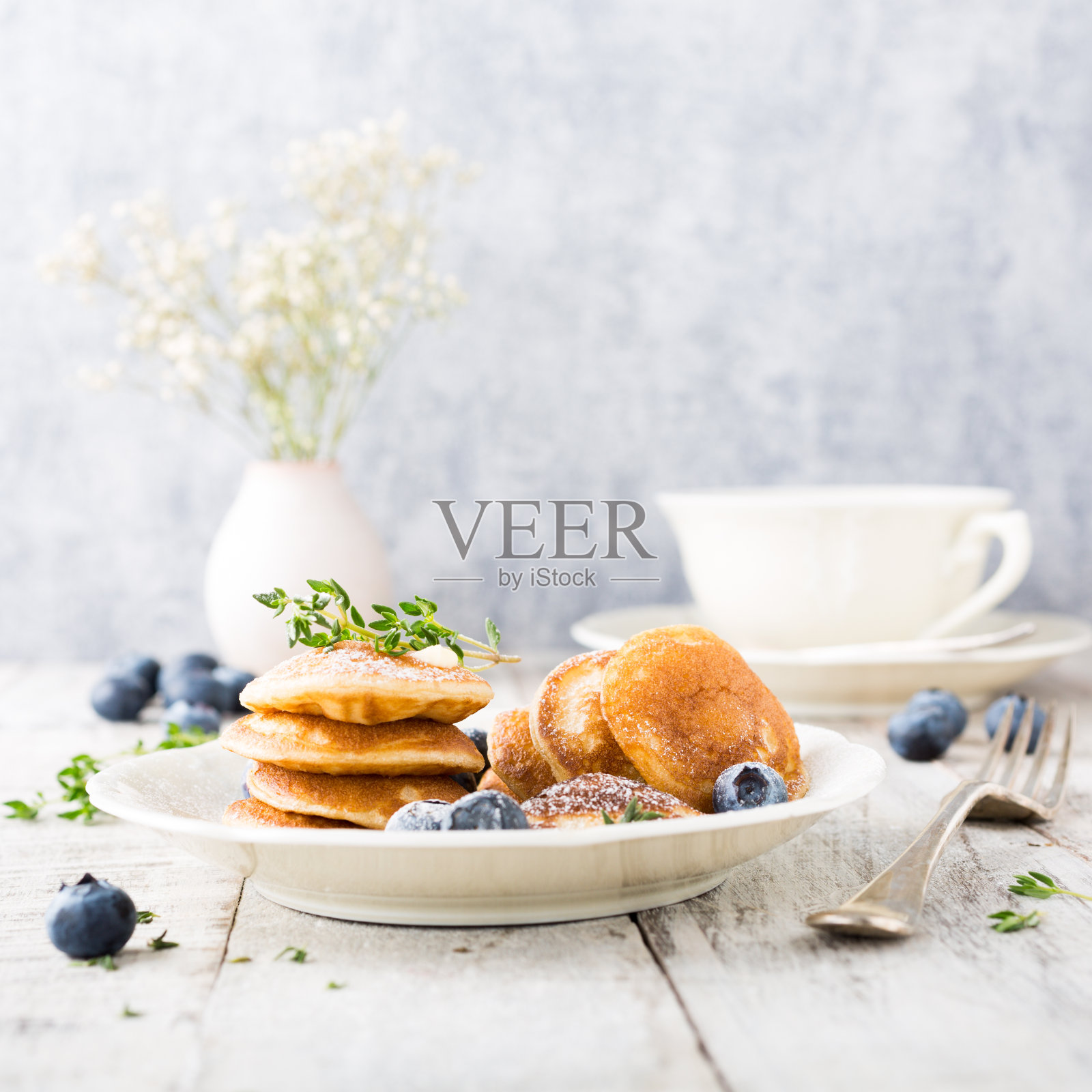 荷兰小煎饼，叫poffertjes照片摄影图片