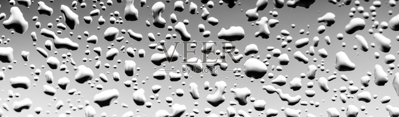 玻璃背景上的雨滴照片摄影图片