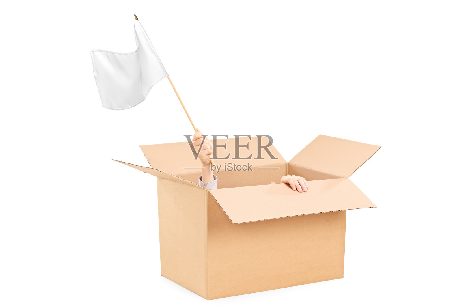 一个男人在纸盒里挥舞着白旗照片摄影图片