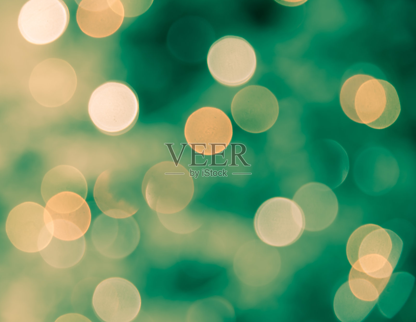 模糊散焦光在绿色和黄色背景照片摄影图片