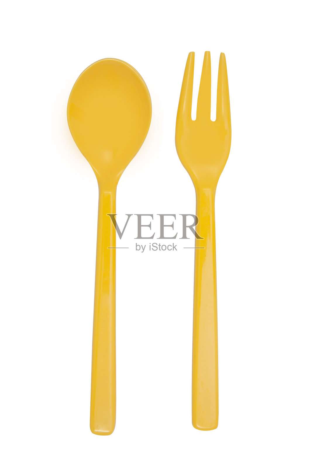 黄色的塑料叉子和勺子照片摄影图片