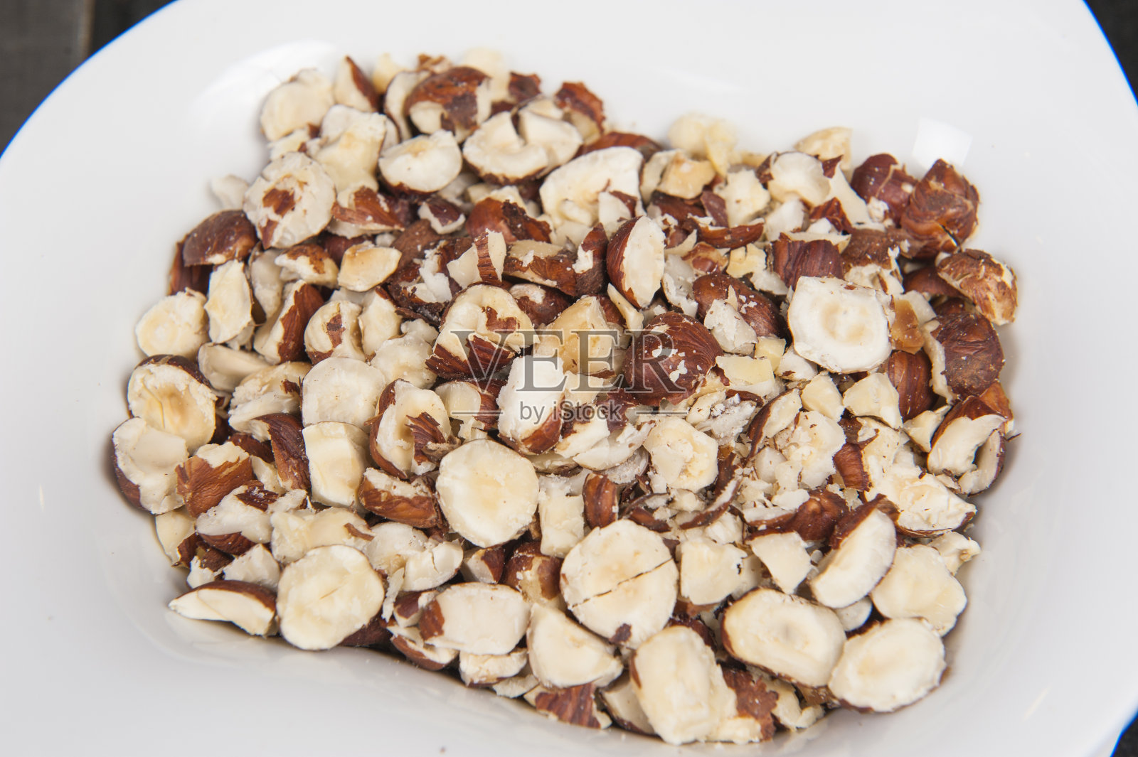 碗杏仁坚果零食照片摄影图片