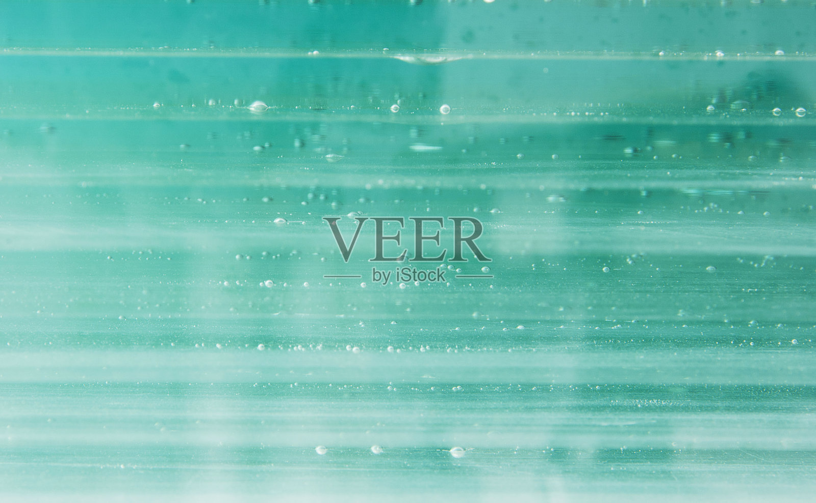 玻璃的背景纹理与水平线条和气泡照片摄影图片