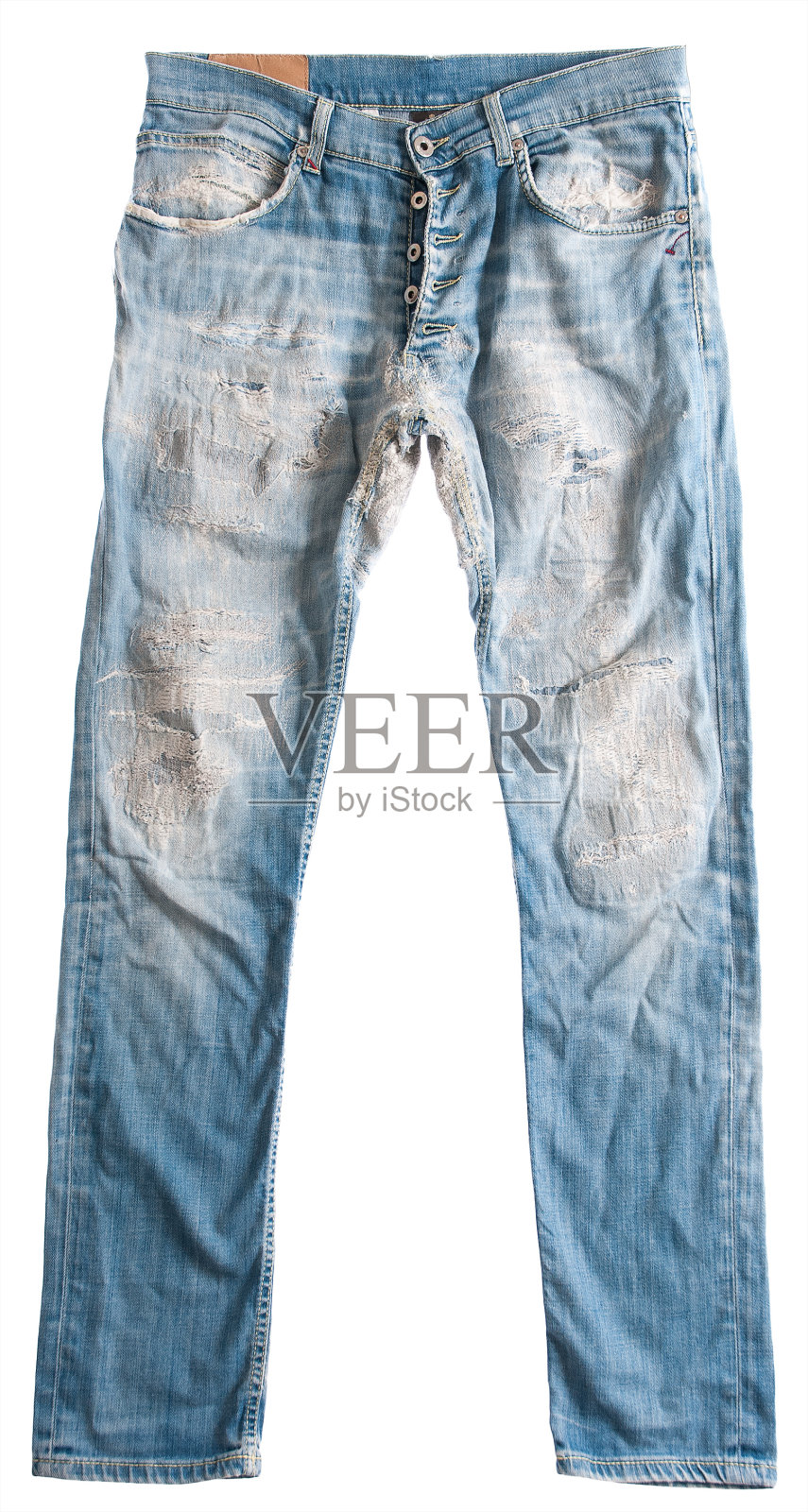 破旧的牛仔裤裤子上的白色照片摄影图片