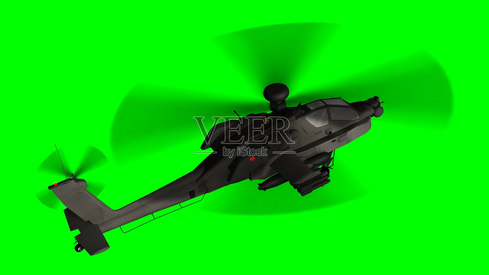 绿色屏幕上的武装阿帕奇攻击直升机正在飞行照片摄影图片