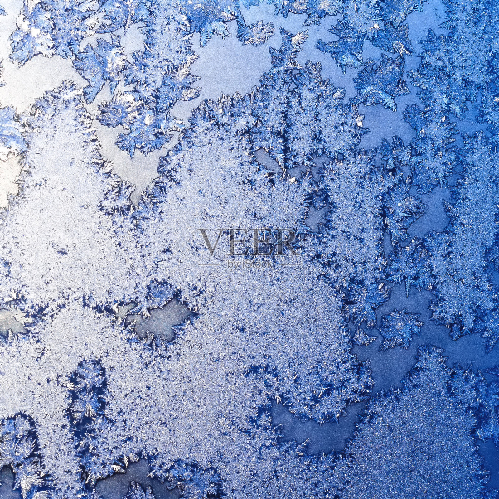 冻结的窗户上有冰和霜照片摄影图片