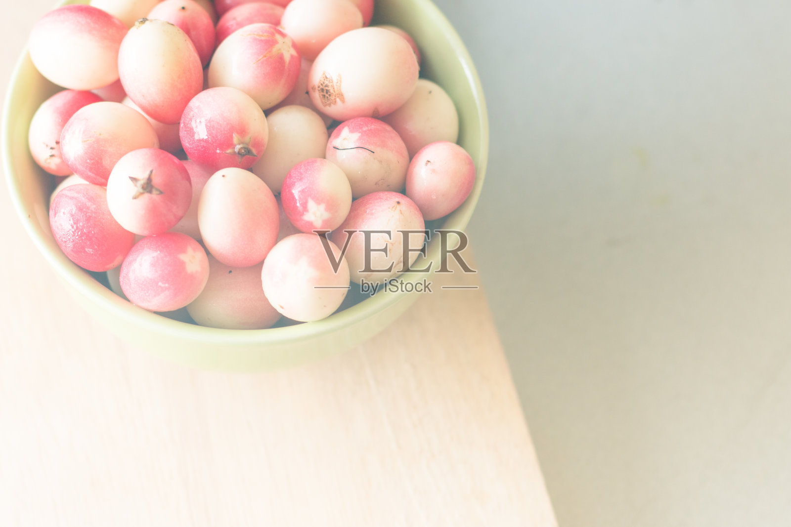 卡隆达在绿碗里照片摄影图片