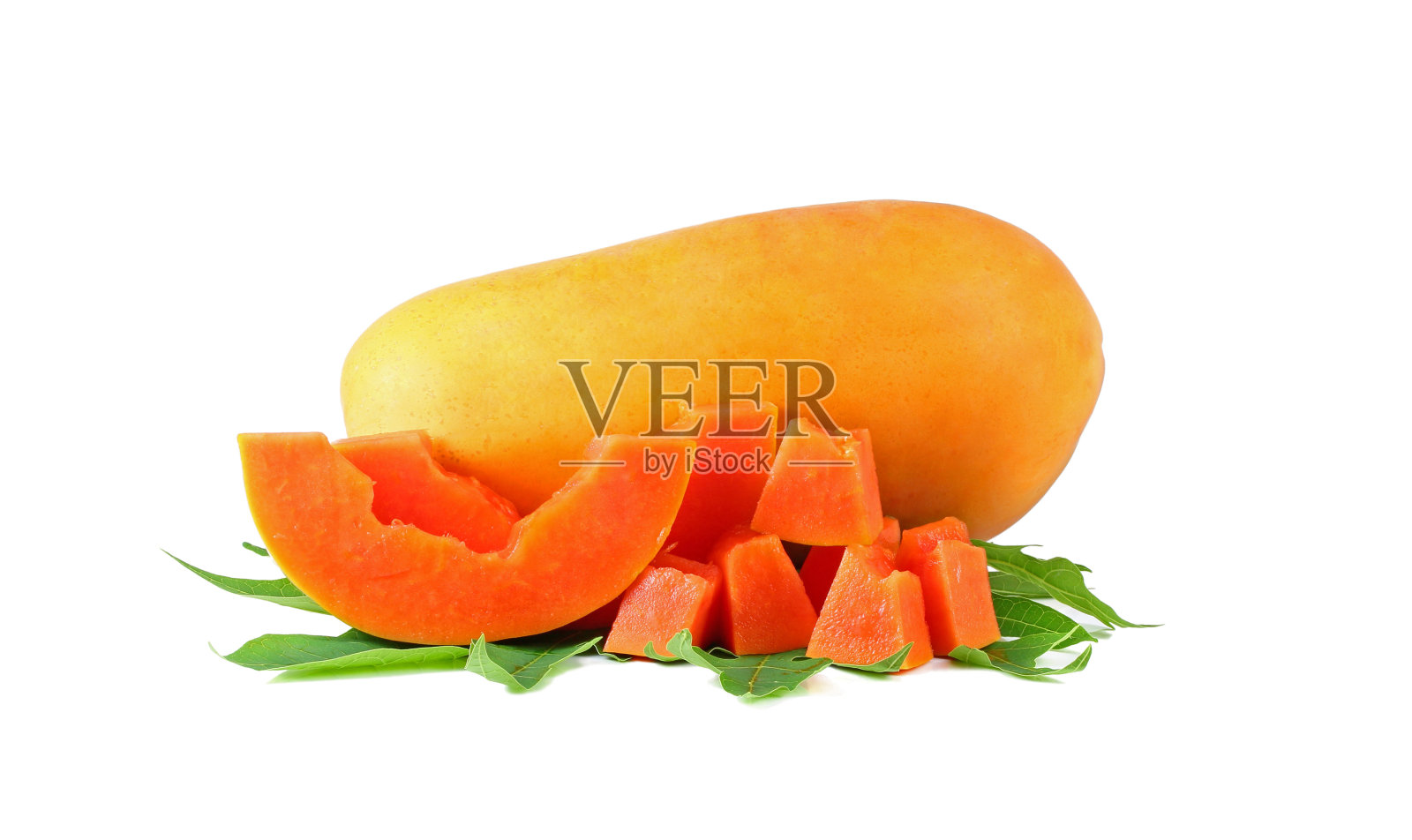 甜甜的木瓜配上绿色的木瓜叶照片摄影图片