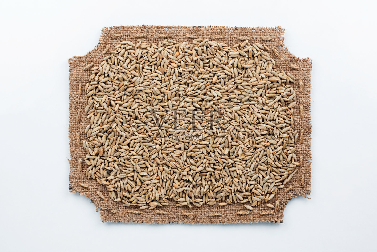 用粗麻布和黑麦谷物制成的提花框架照片摄影图片