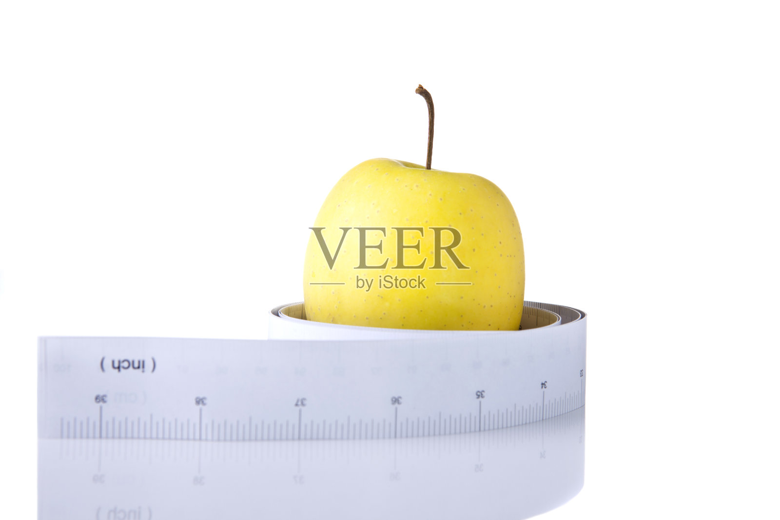 苹果和卷尺照片摄影图片