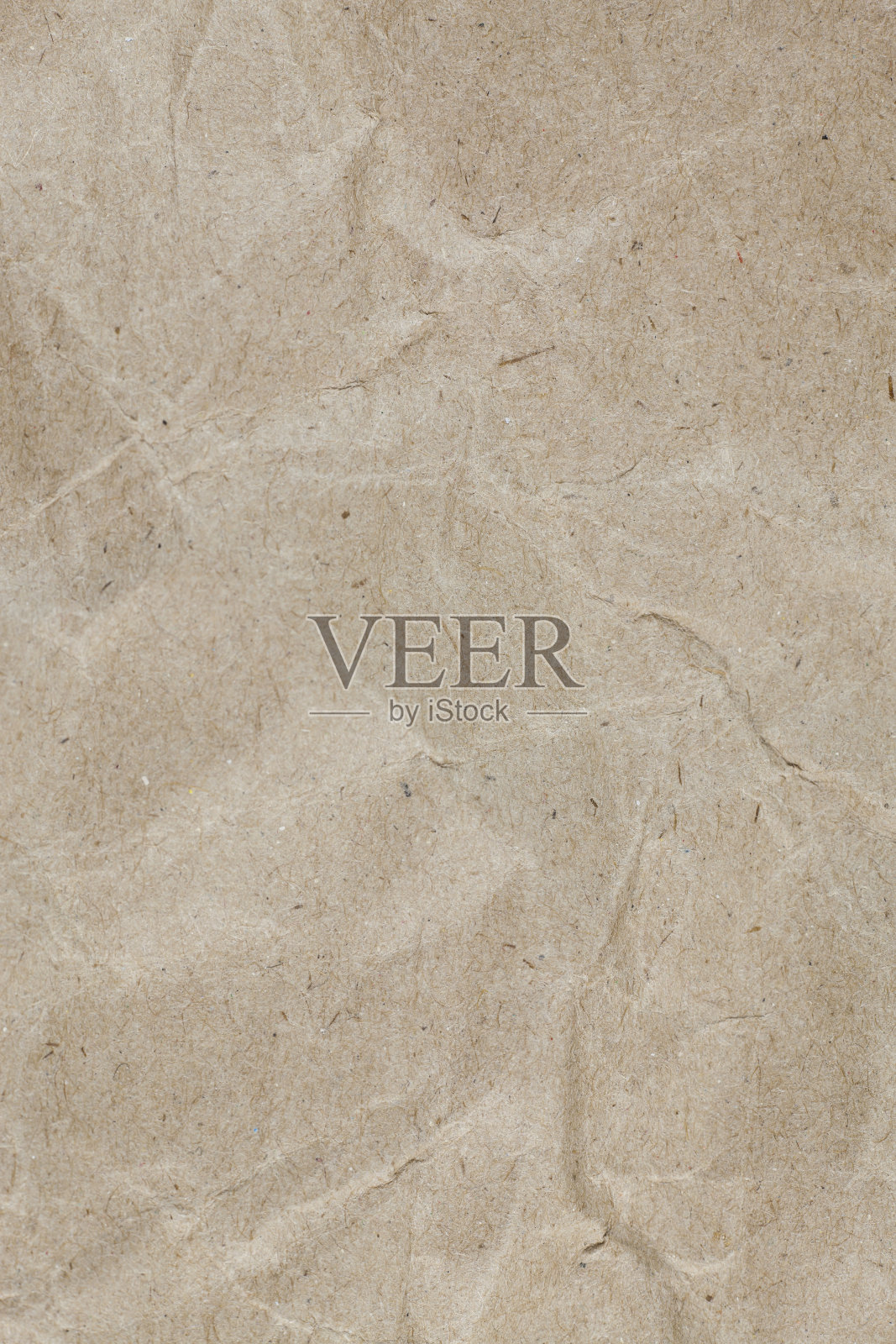 纹理皱巴巴的包装棕色纸背景。照片摄影图片