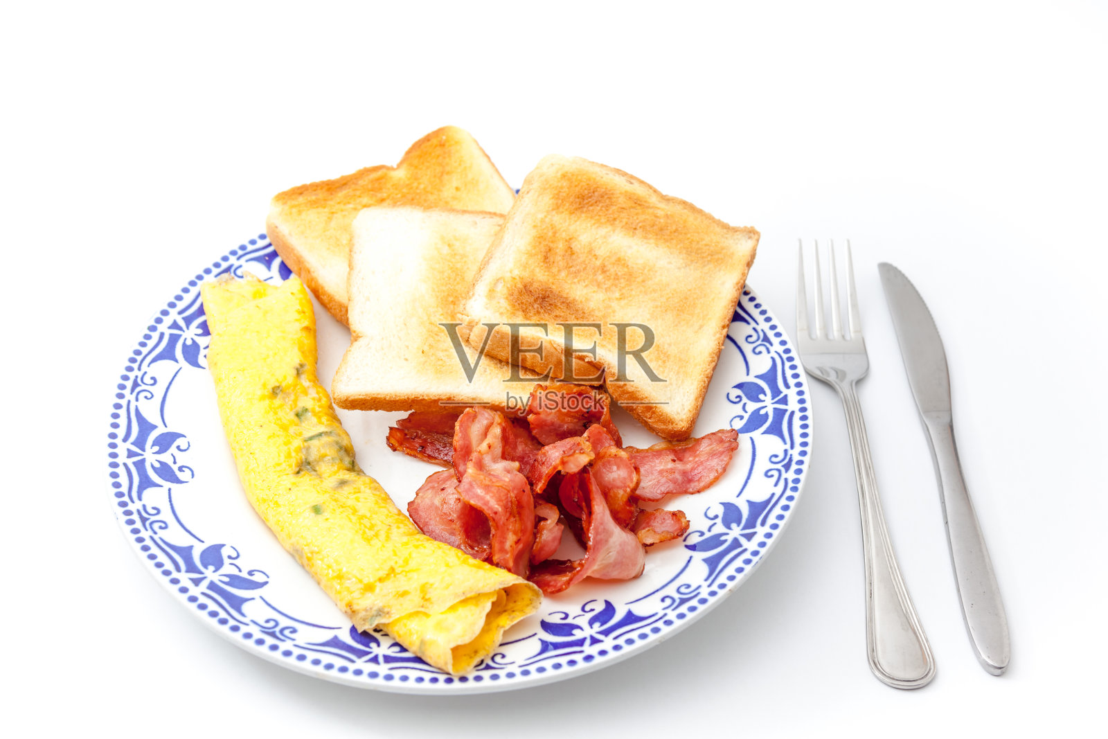 用刀叉腌肉加鸡蛋照片摄影图片