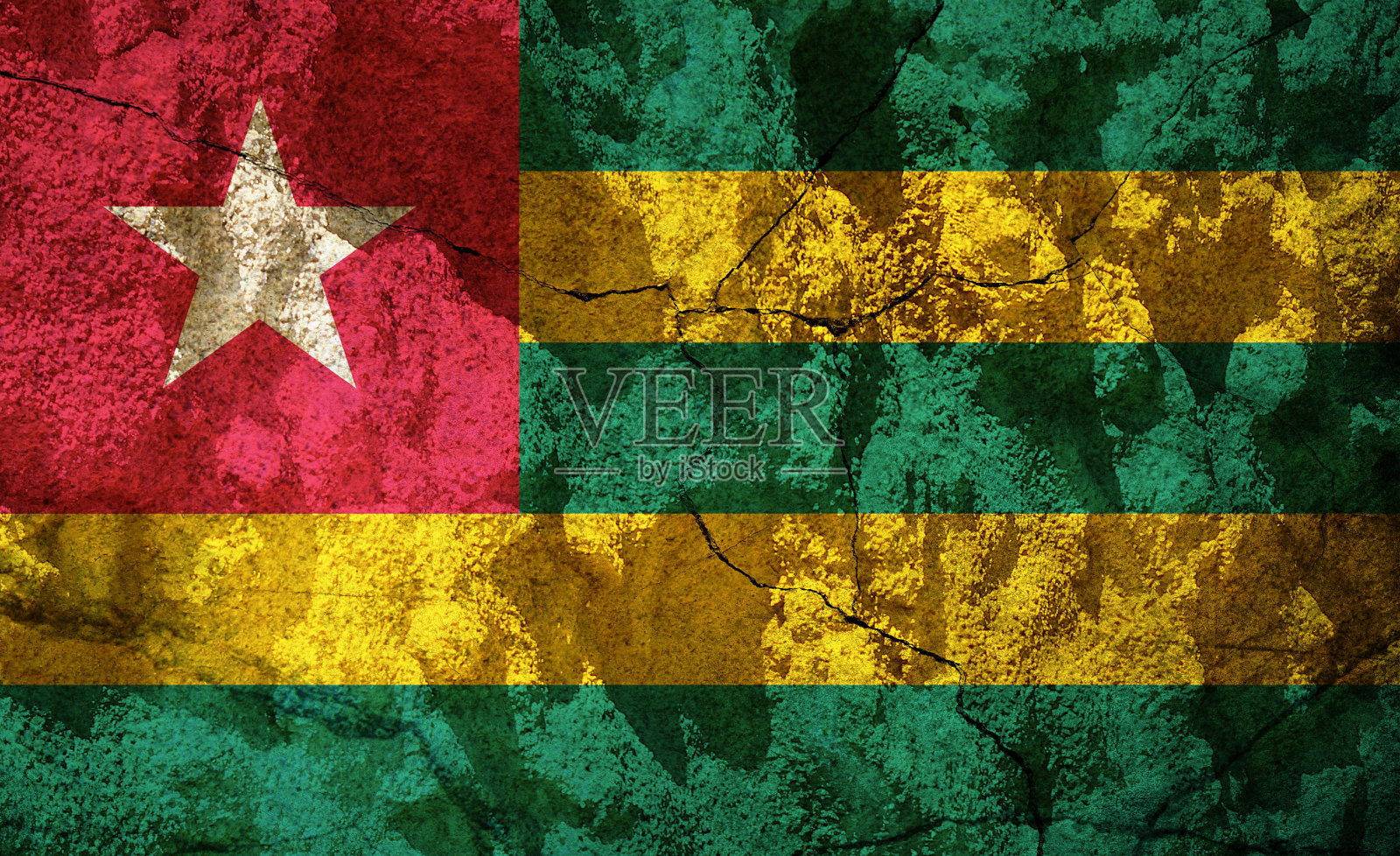 石头上的多哥旗照片摄影图片