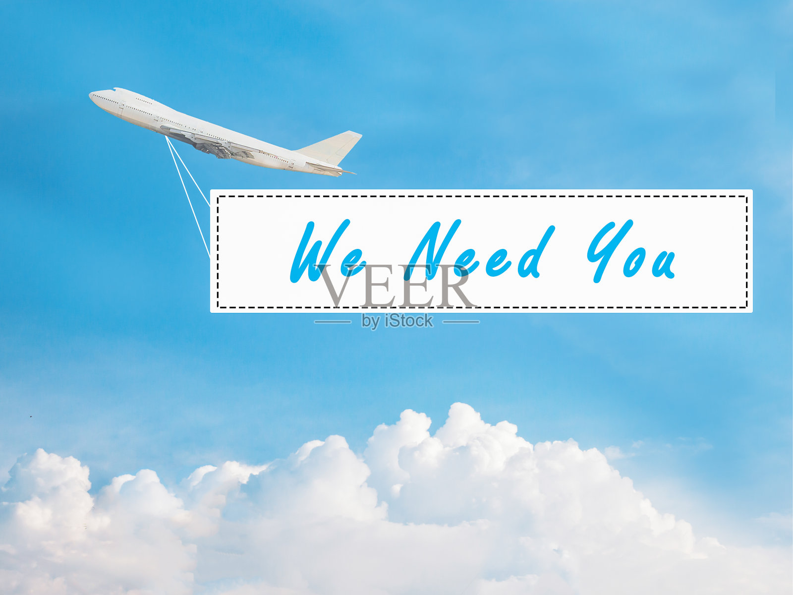 蓝天和白云上的“我们需要你”照片摄影图片