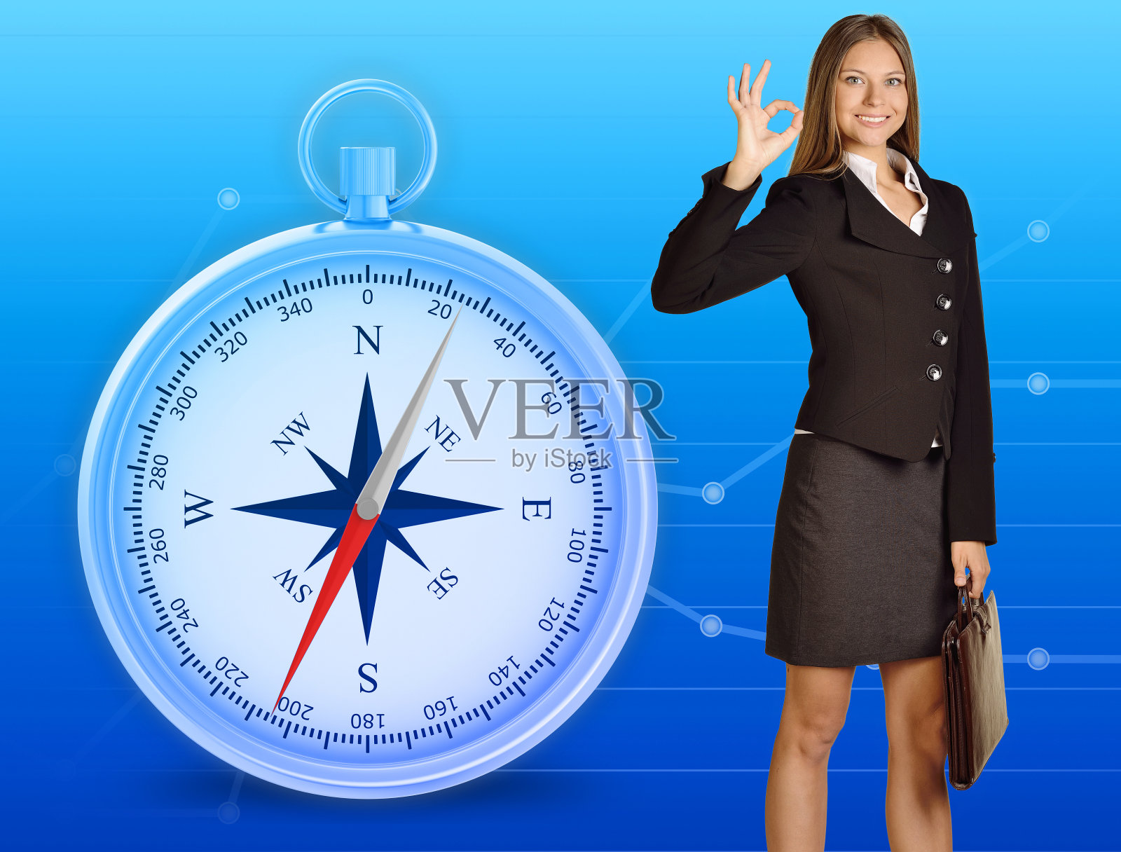 手拿皮包的女孩站着，显示ok标志照片摄影图片