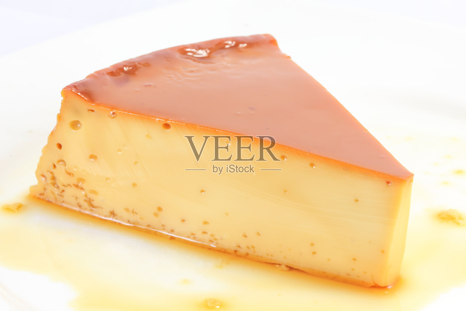 焦糖蛋布丁片照片摄影图片