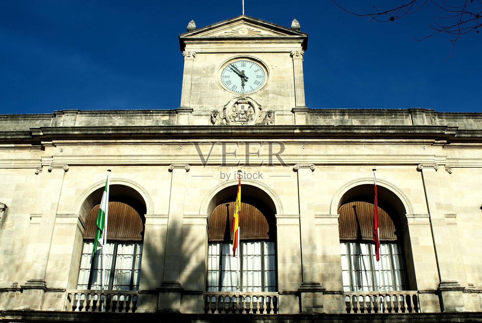 古老的塞维利亚市政厅时钟照片摄影图片