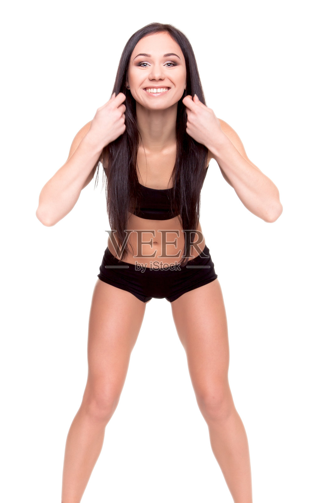 漂亮的年轻女子在健身中心锻炼照片摄影图片