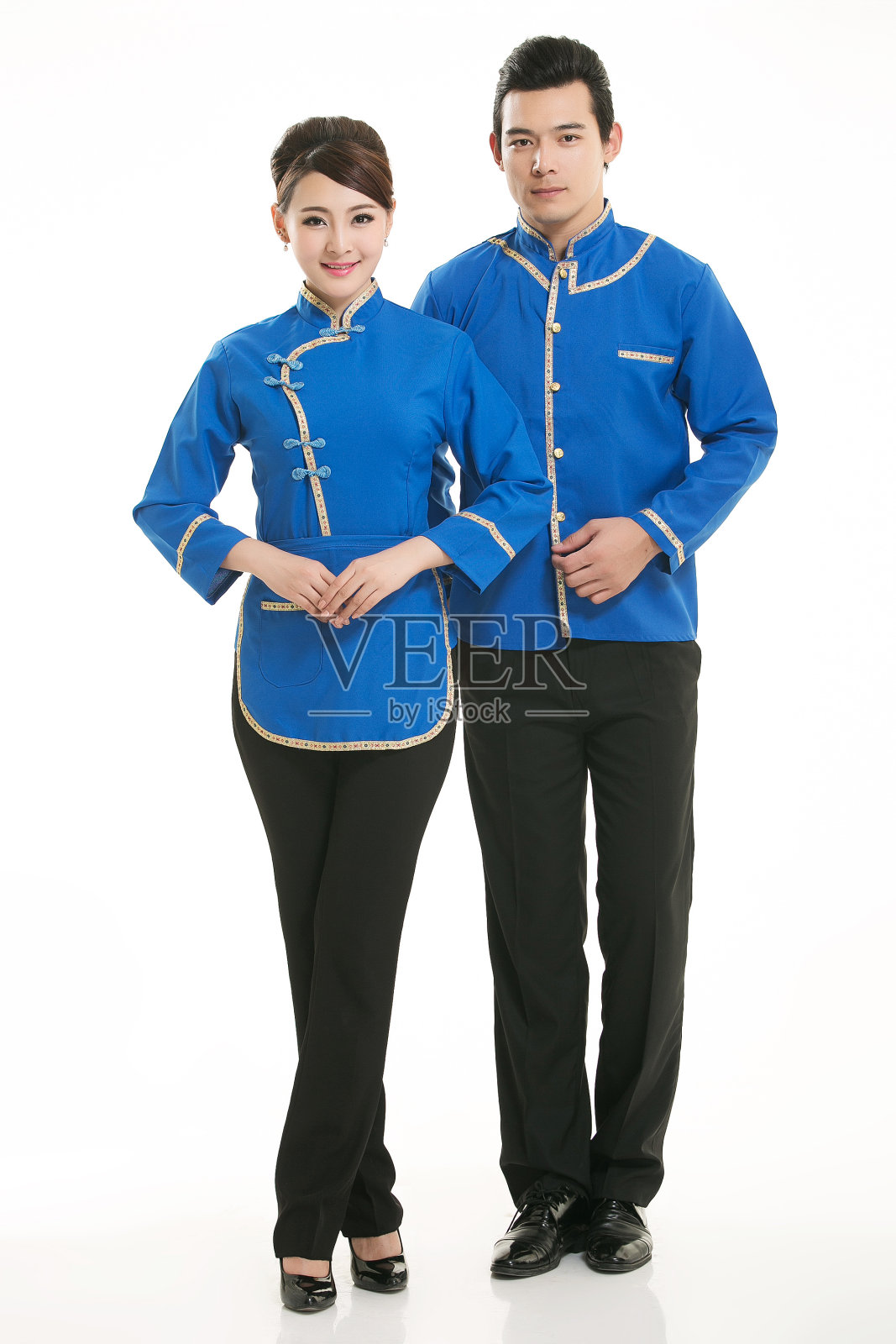 穿着服装职业中国服务员在白色的背景照片摄影图片