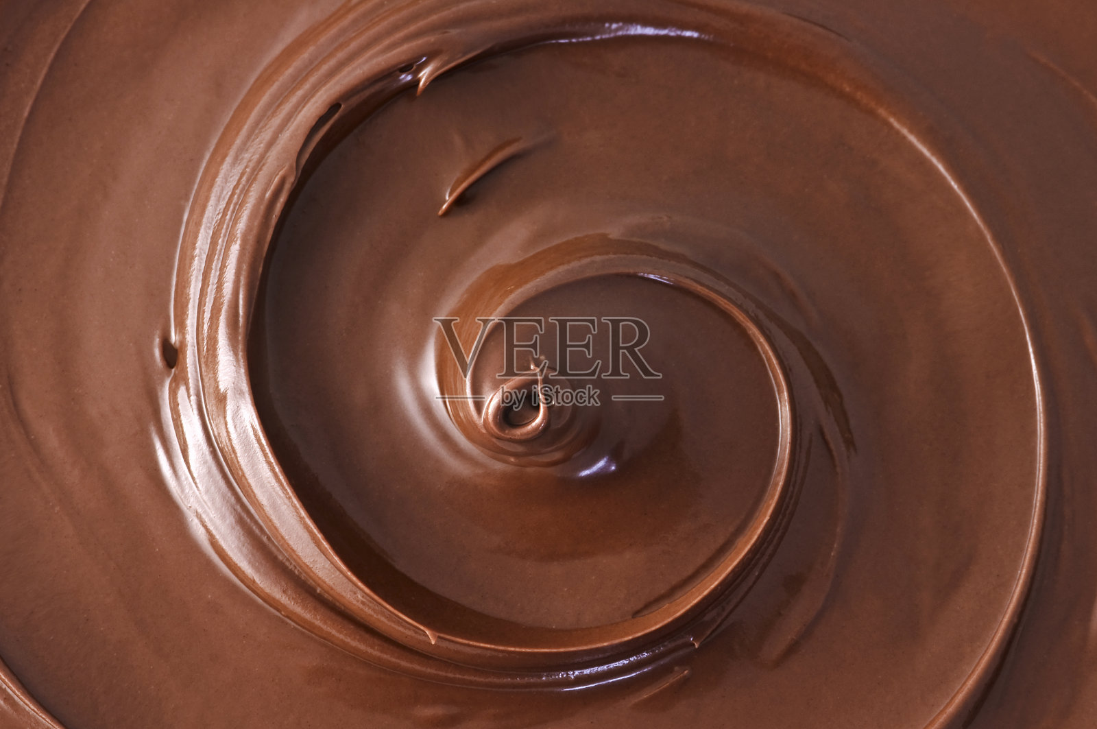 丰富的棕色巧克力漩涡特写照片摄影图片