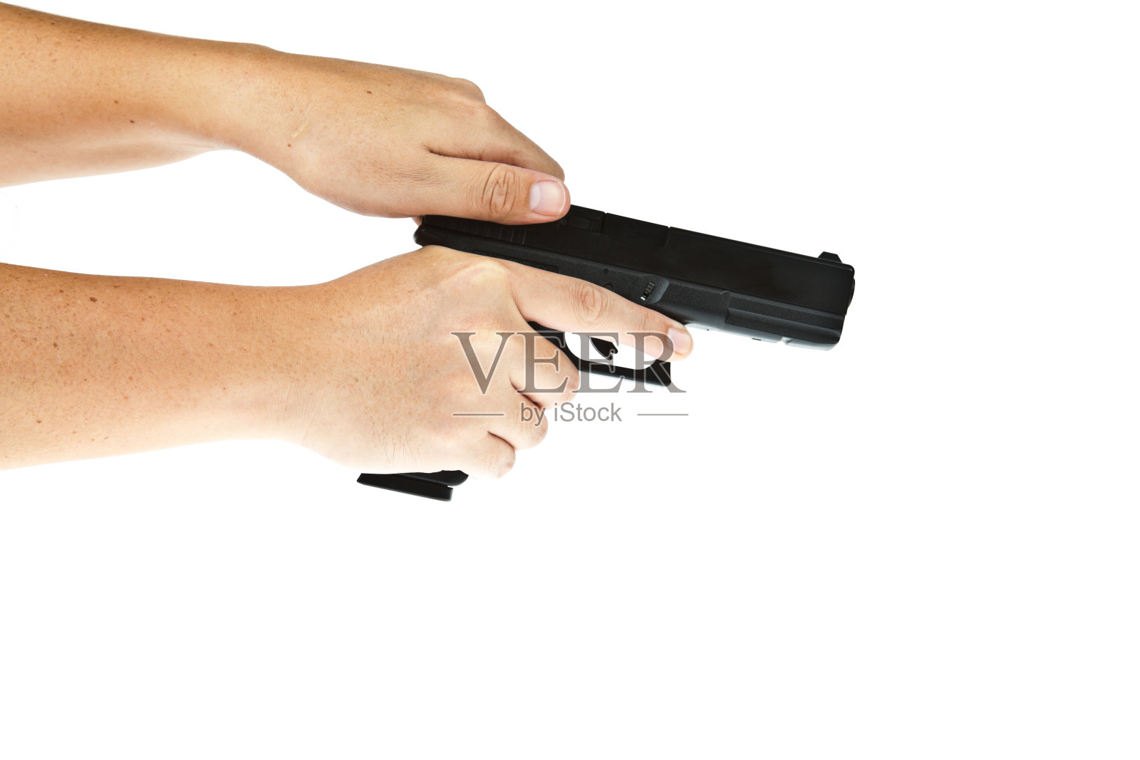 气软手枪，格洛克模型的手照片摄影图片