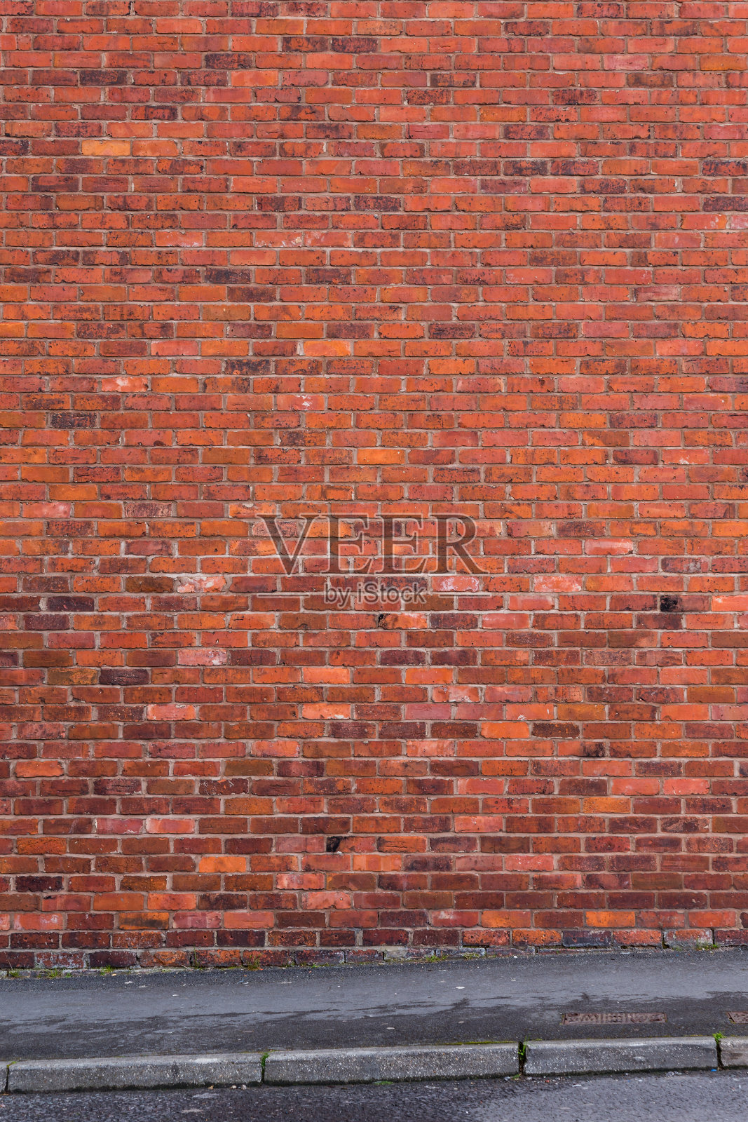 前面有铺面的砖墙照片摄影图片