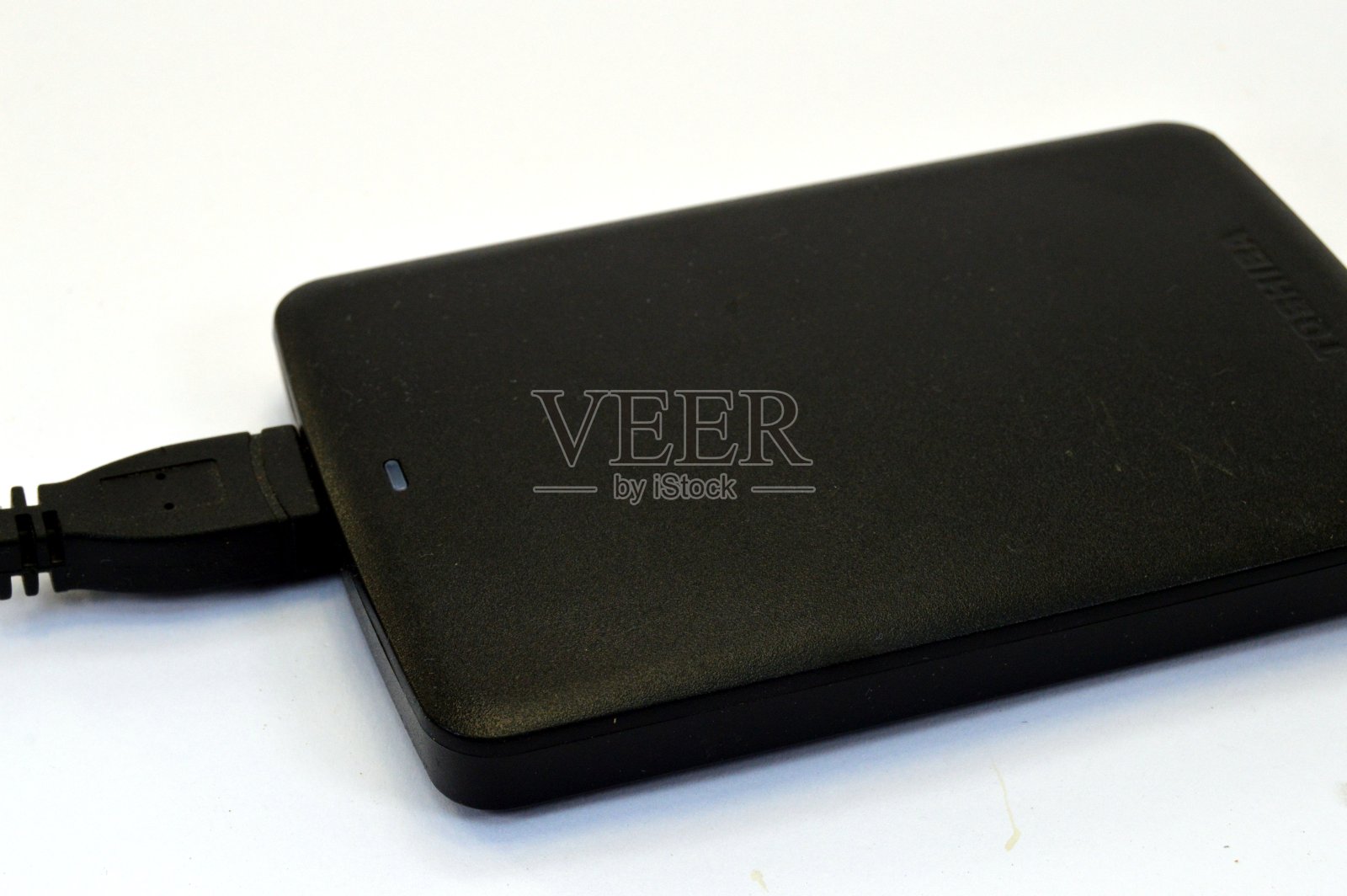 一个四环素的外部硬盘。照片摄影图片