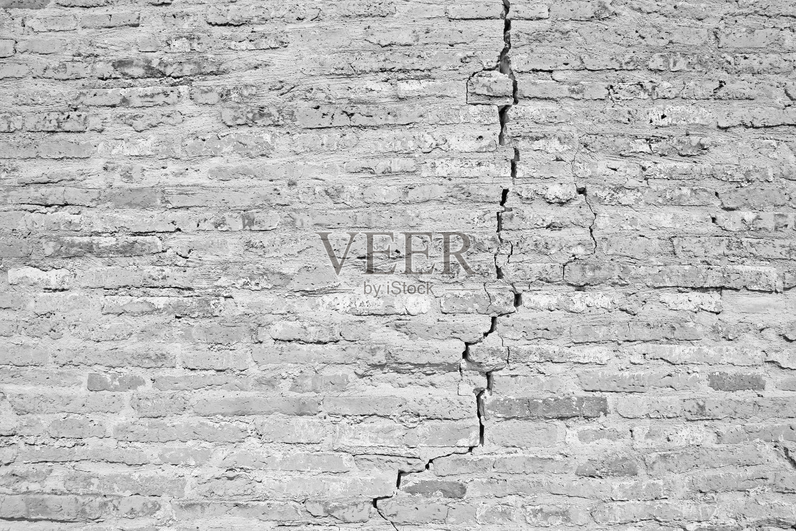 白色裂砖墙照片摄影图片