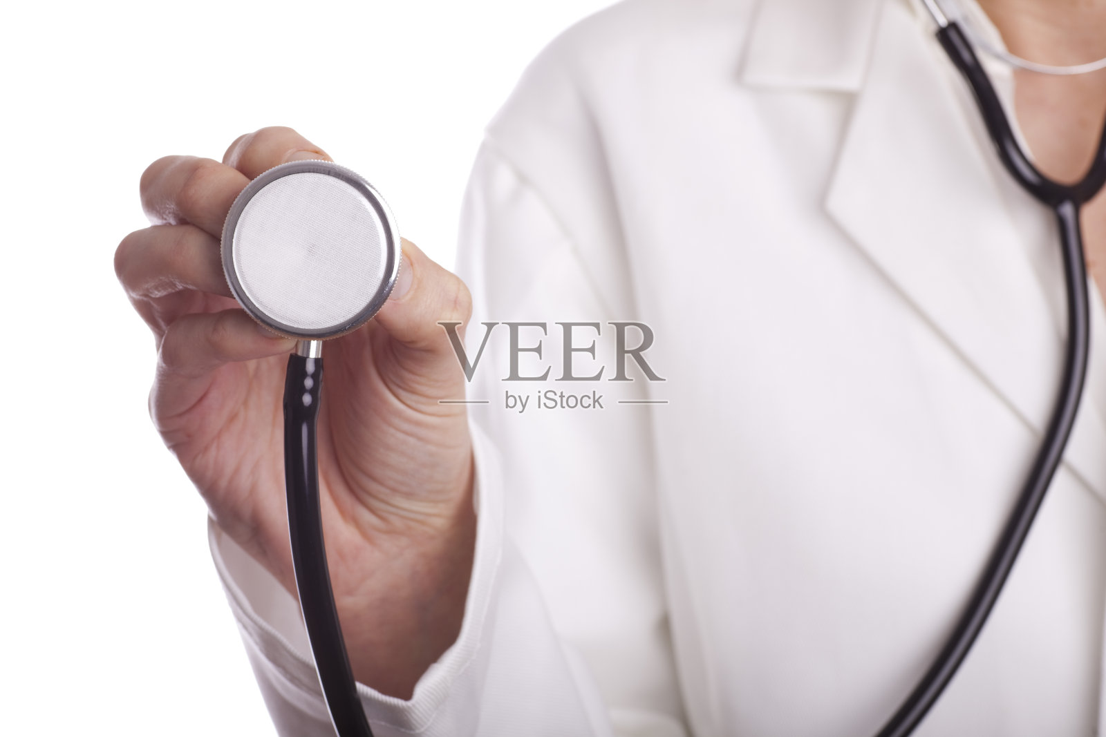 女医生与听诊器。照片摄影图片