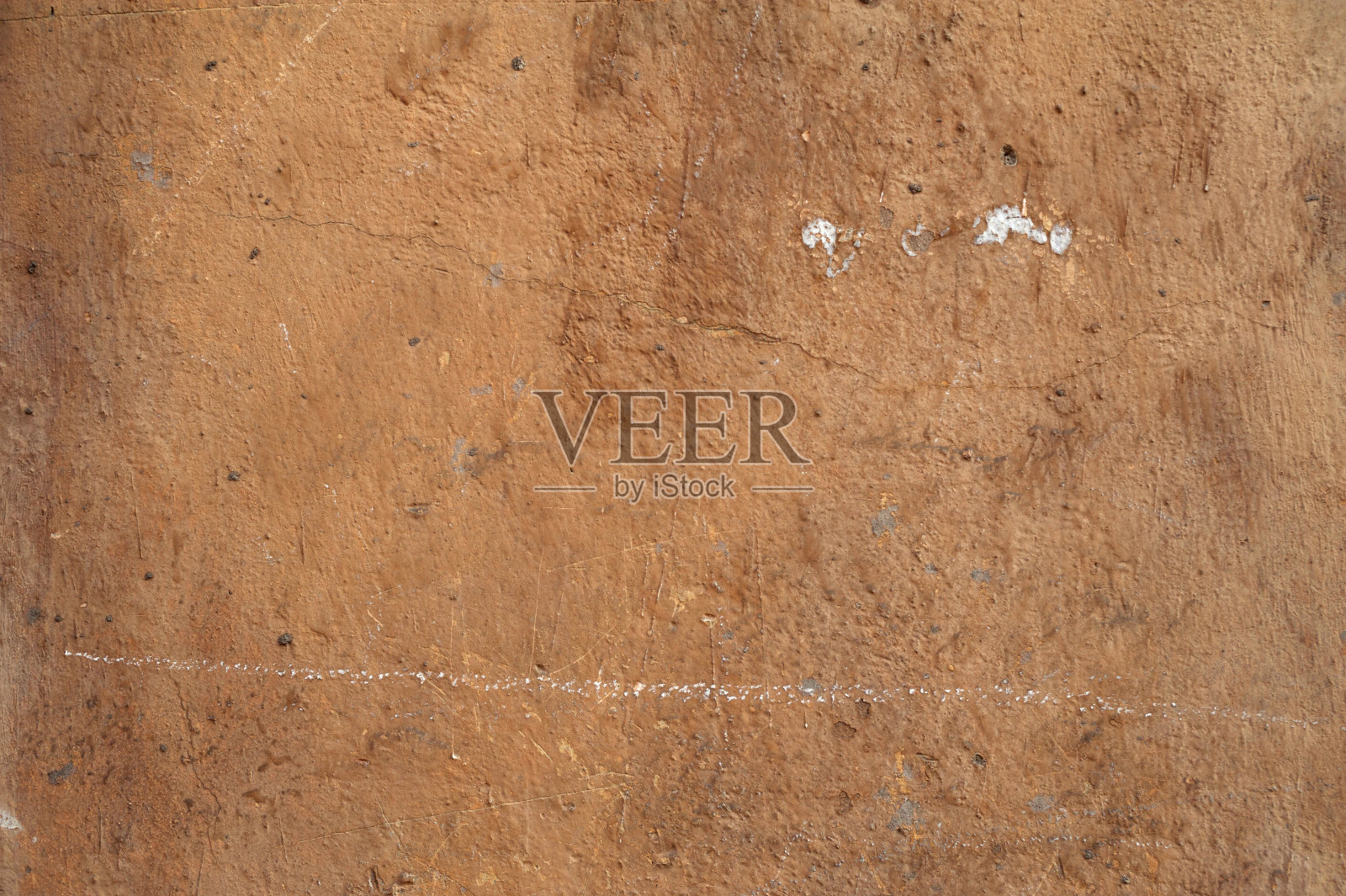 黄色灰泥覆盖的旧墙的纹理照片摄影图片