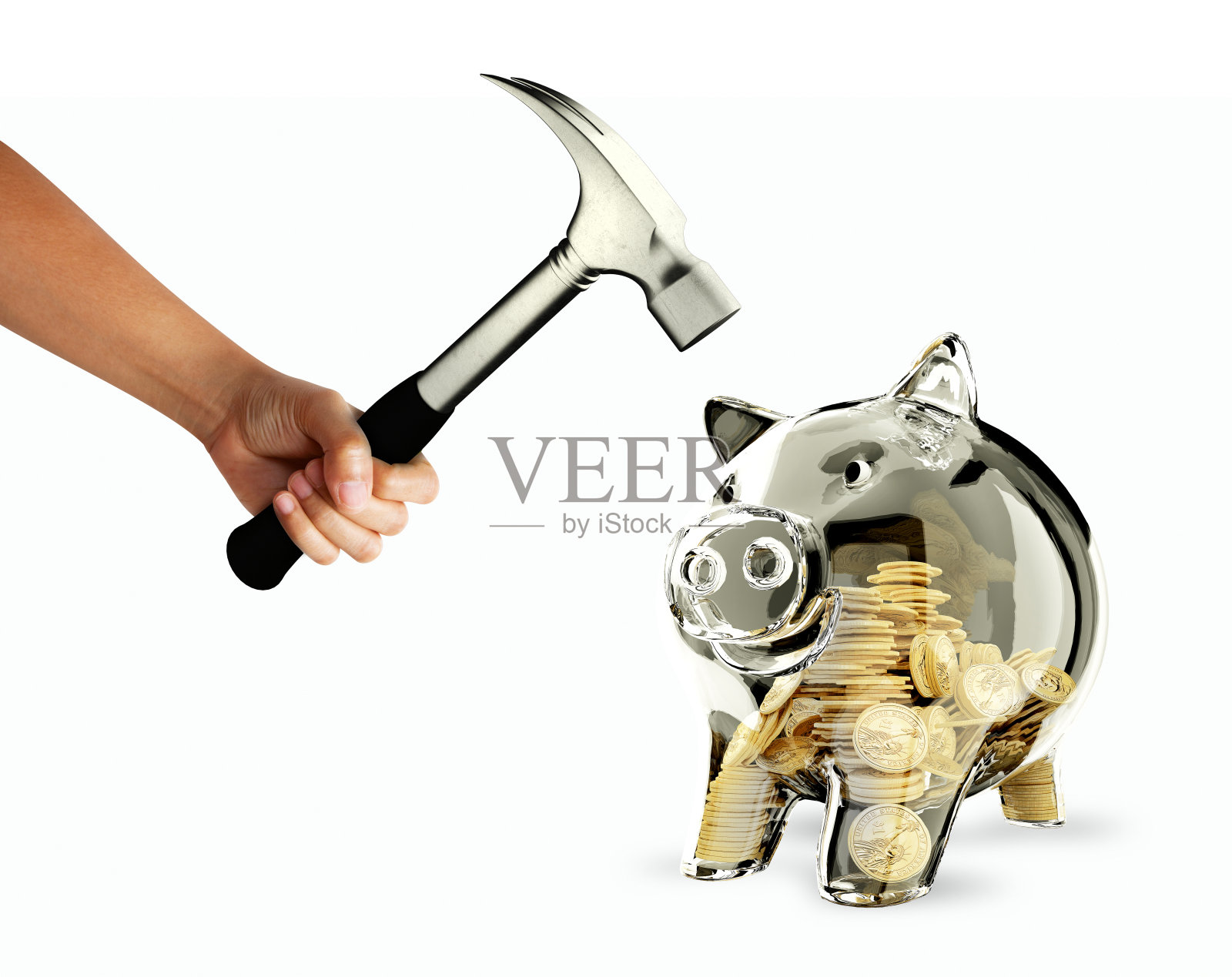 用金属锤敲打存钱罐照片摄影图片