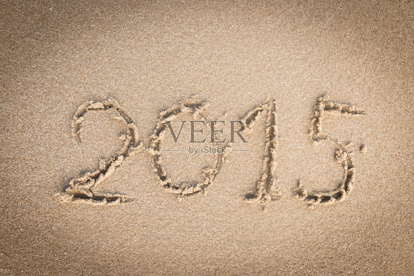 2015年新年写在沙上照片摄影图片