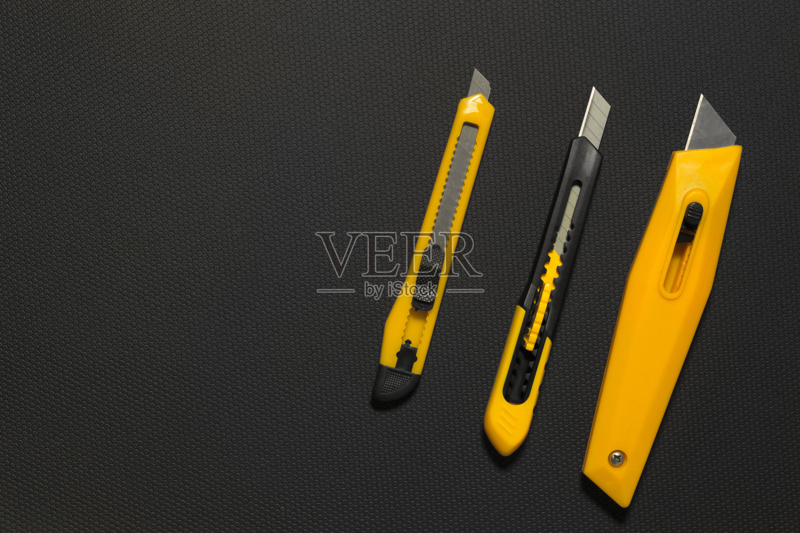 裁纸刀、办公设备、美工刀隔离后不受bl照片摄影图片